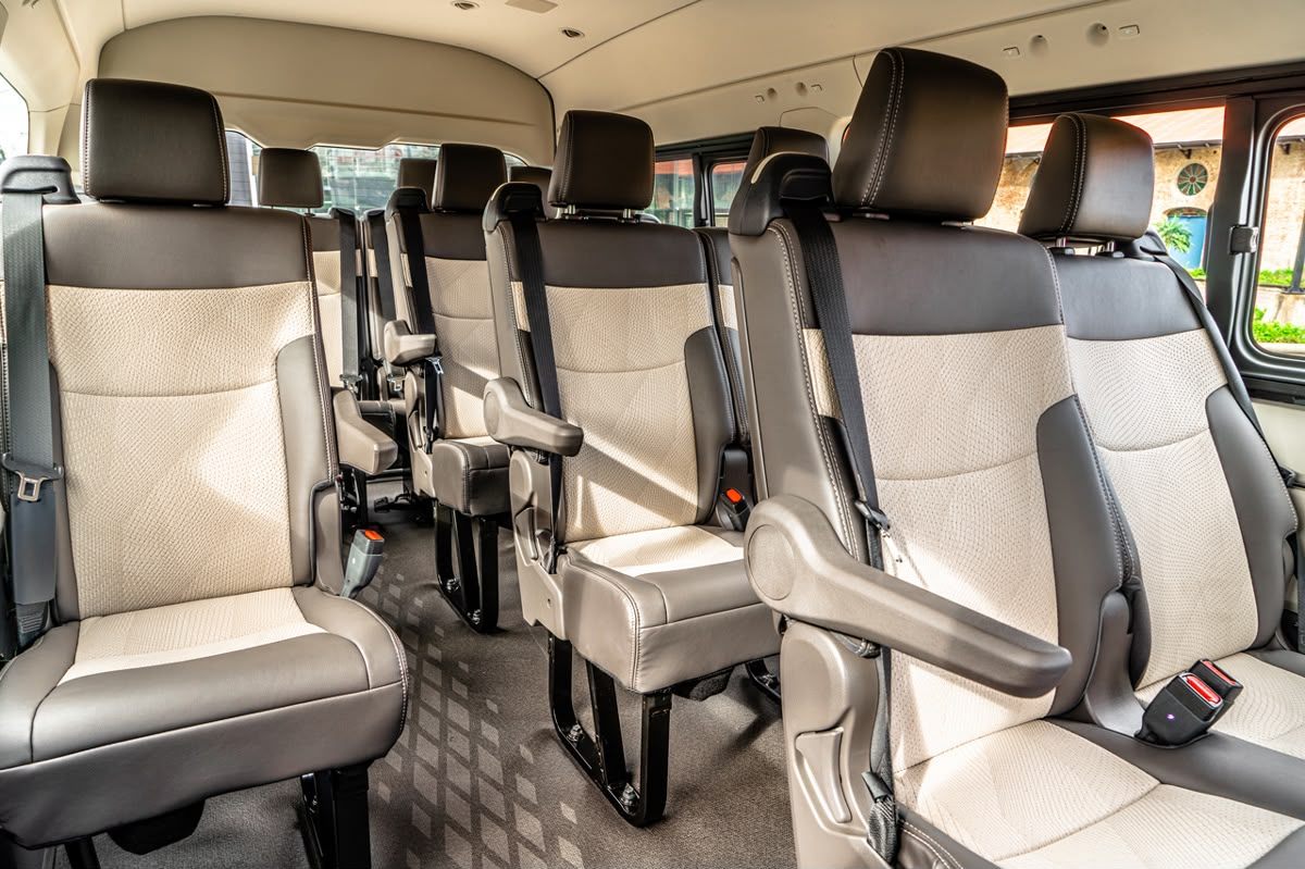 Spotless two-tone seats inside a Toyota Hiace van
